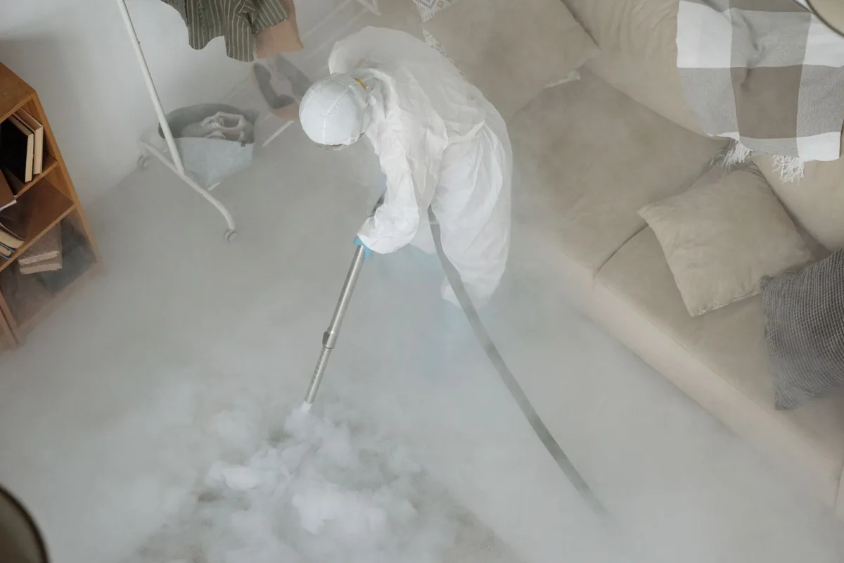 Biohazard cleanup technician in protective equipment, Leonardo, NJ